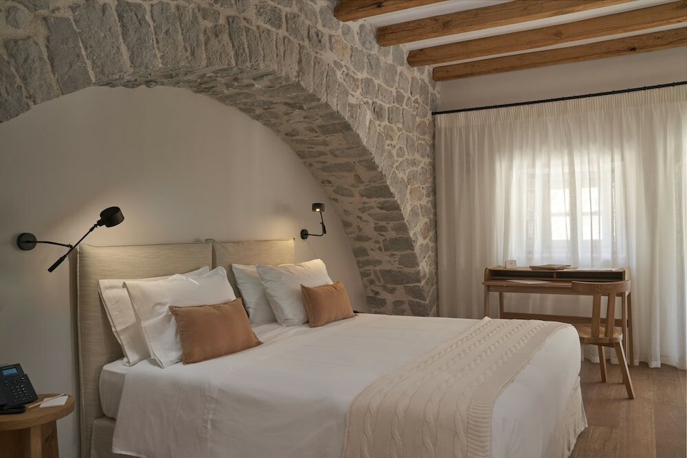 Фото Mandraki Beach Resort - Adults Only