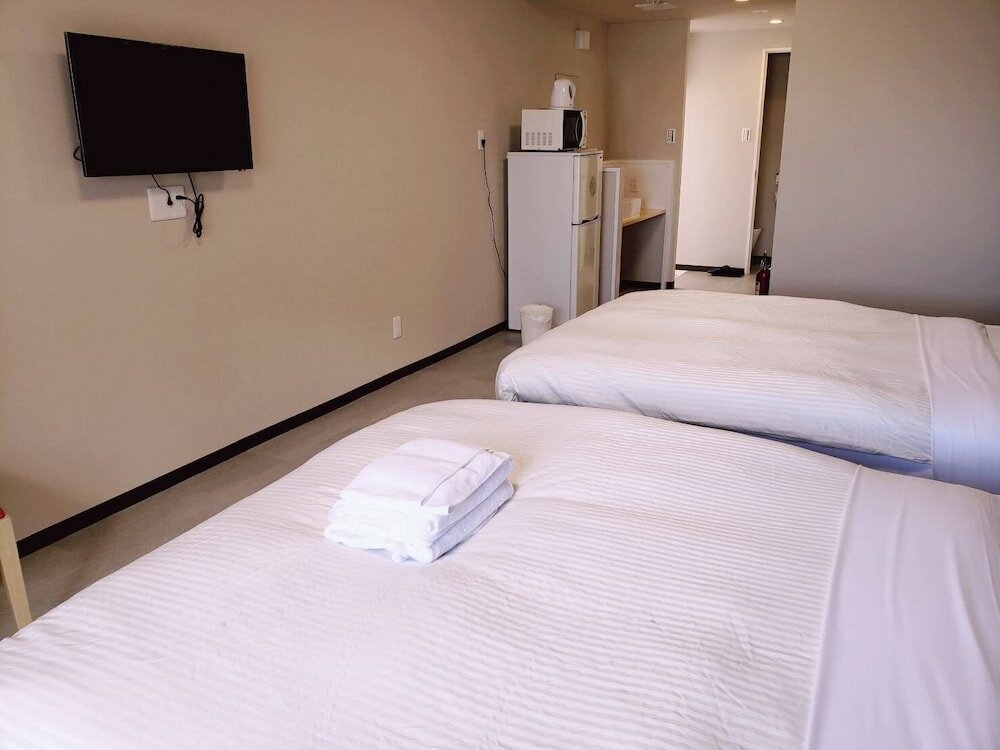 Фото Mr. Kinjo Happiness Resort 1