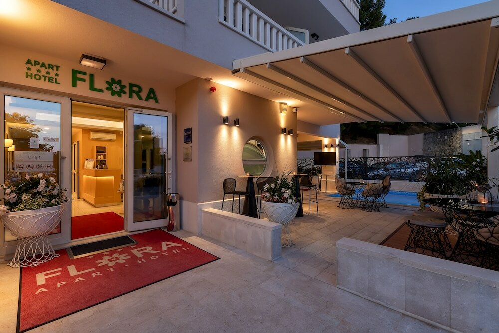 Фото Aparthotel Flora