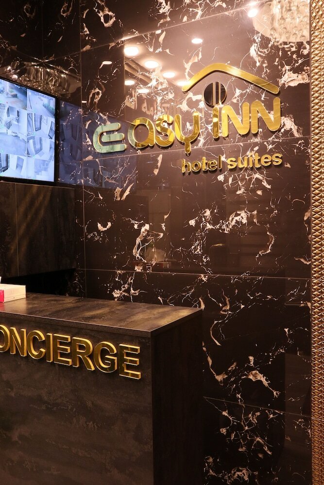 Фото Easy Inn Hotel Suites