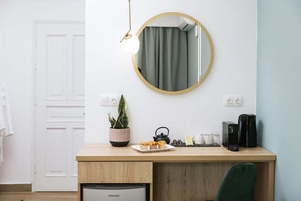 Фото Ermis Luxury Suites & Apartments