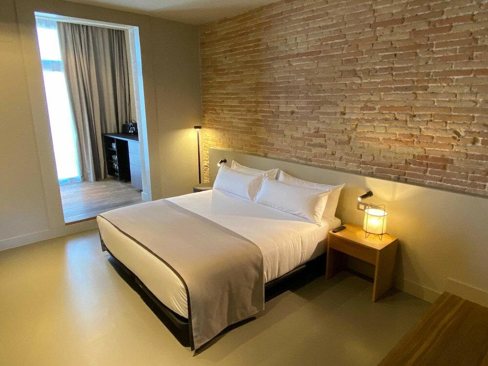 Фото Uma Suites Pau Claris