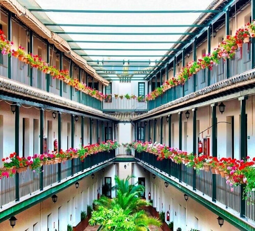 Фото Corral de los Chícharos Apartamentos