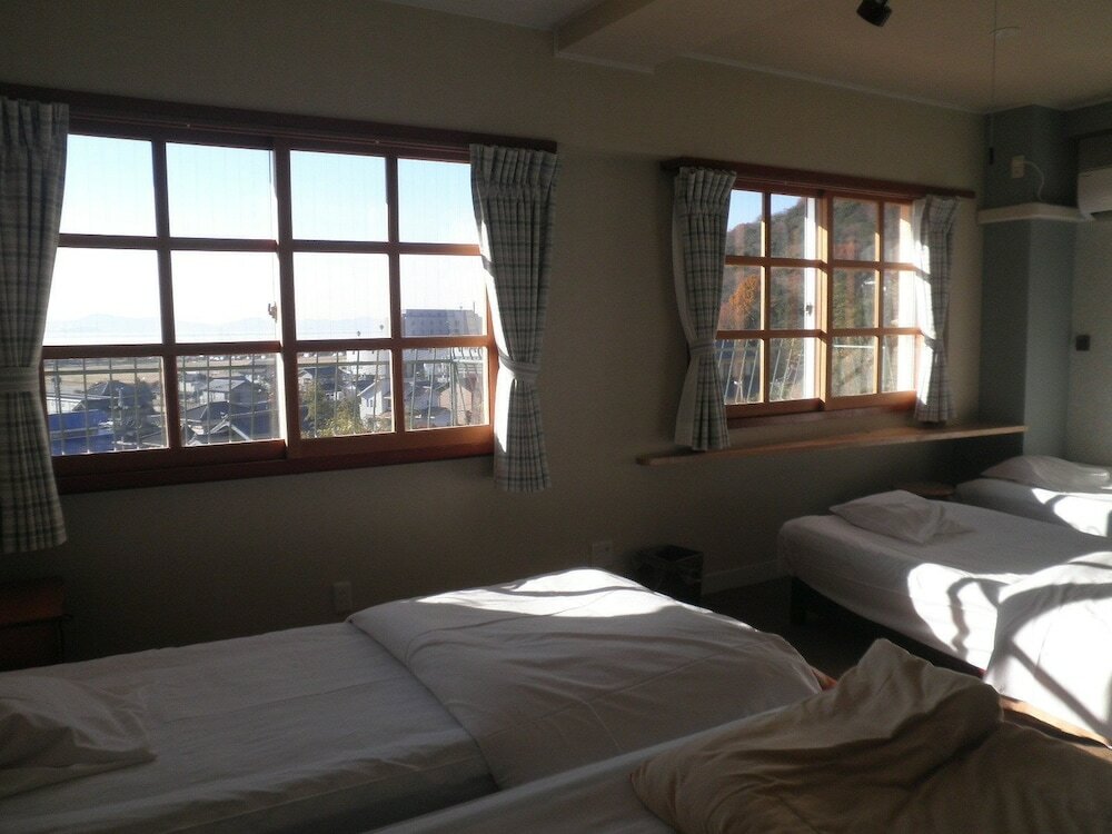 Фото Gamagori Orange Pension