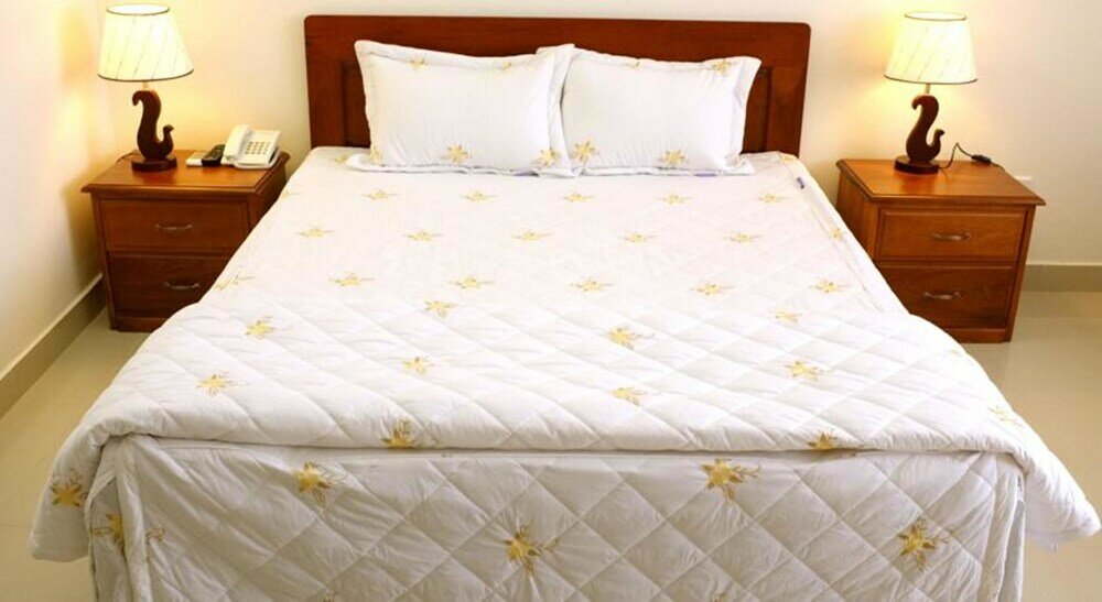 Фото Oyo 103 Airport Family Apartment