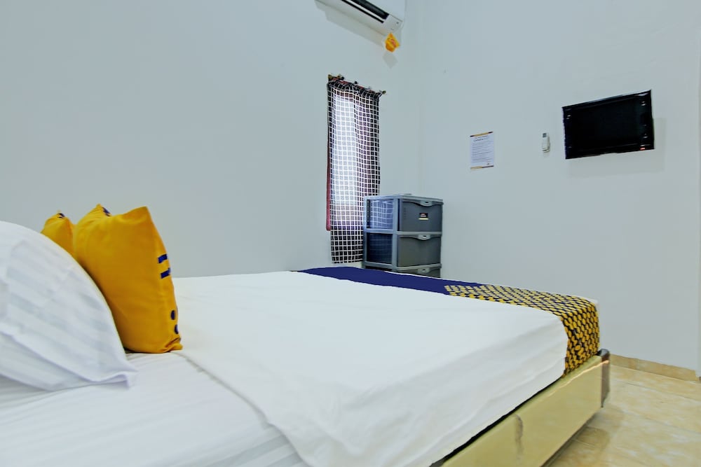 Фото Spot On 92141 Cahaya Kost Syariah