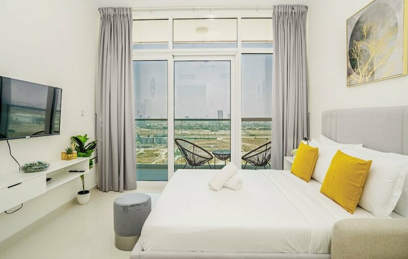 Апартаменты Tanin - Sleek Studio Offering Unobstructed City Views в Дубае