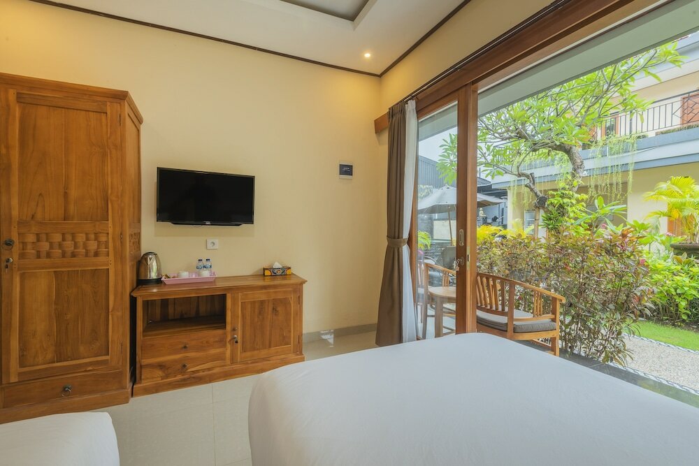Фото Liliy Guest House Legian