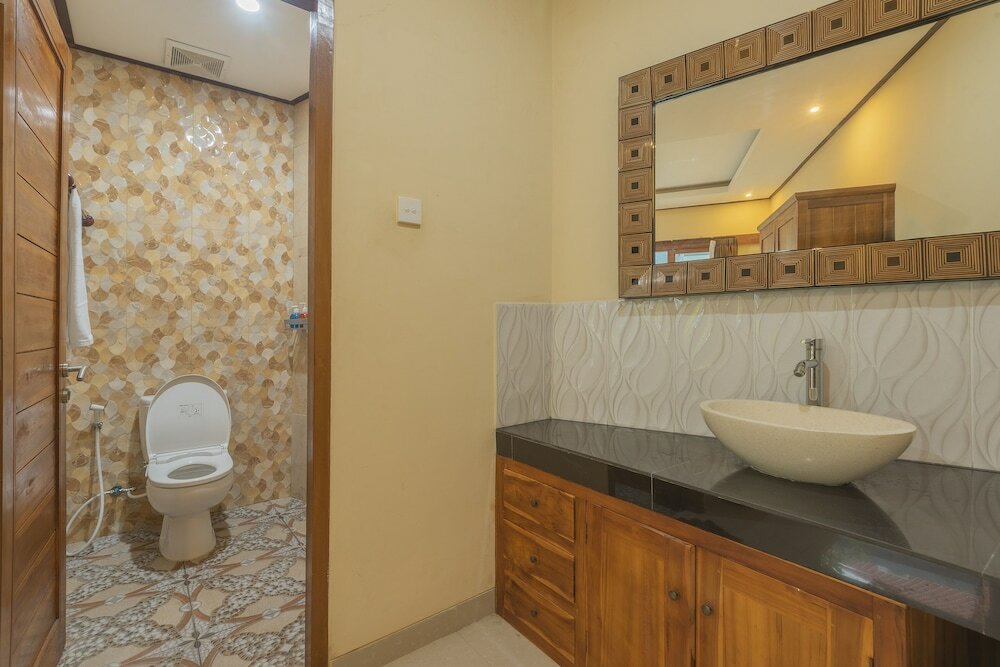 Фото Liliy Guest House Legian