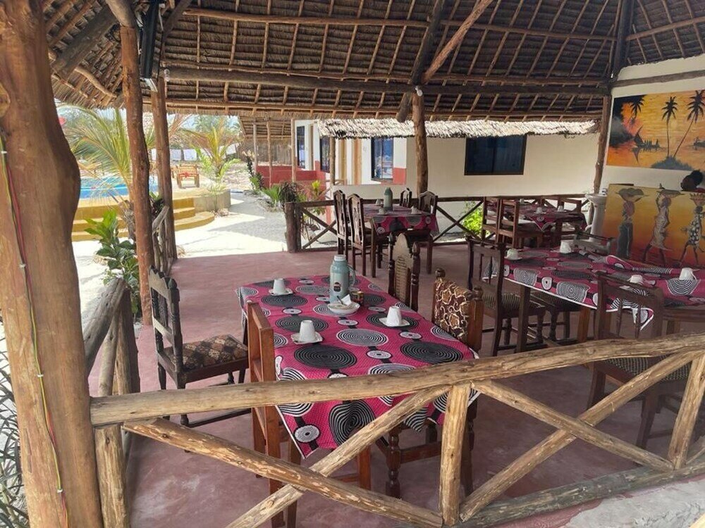 Фото Mkeka Spice Lodge