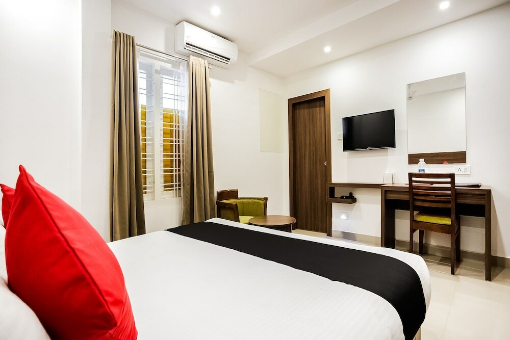 Фото Capital O 60558 Hotel Midhuna International