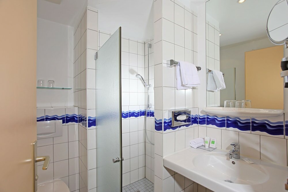 Фото Cliff Wellness Ferienwohnungen Ruegen