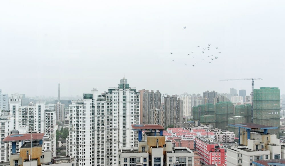 Фото GoNative Downtown Apartment Yu Garden