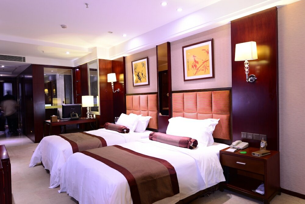 Фото Chengdu Gaoyi Hotel