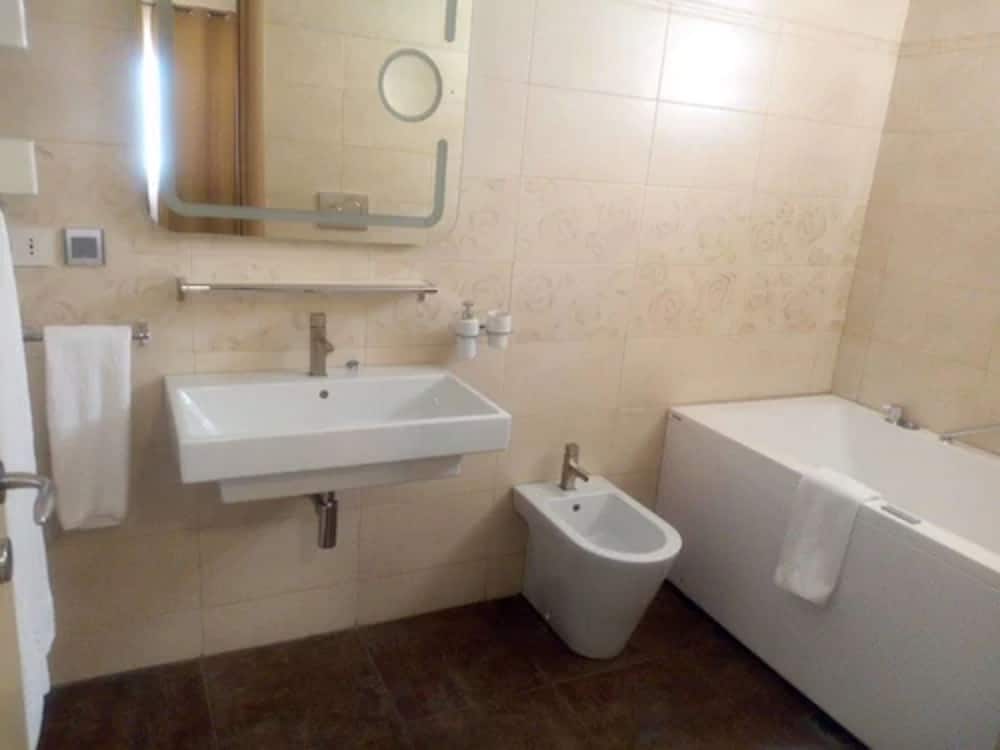 Фото Axis Suites