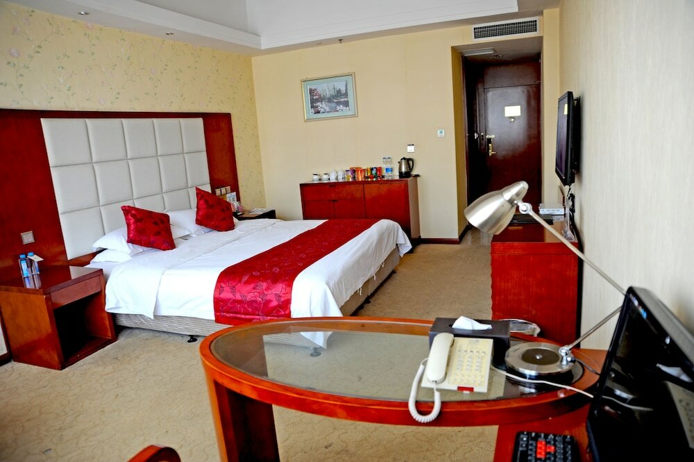 Фото Dinis Business Hotel Kaiyuan Branch