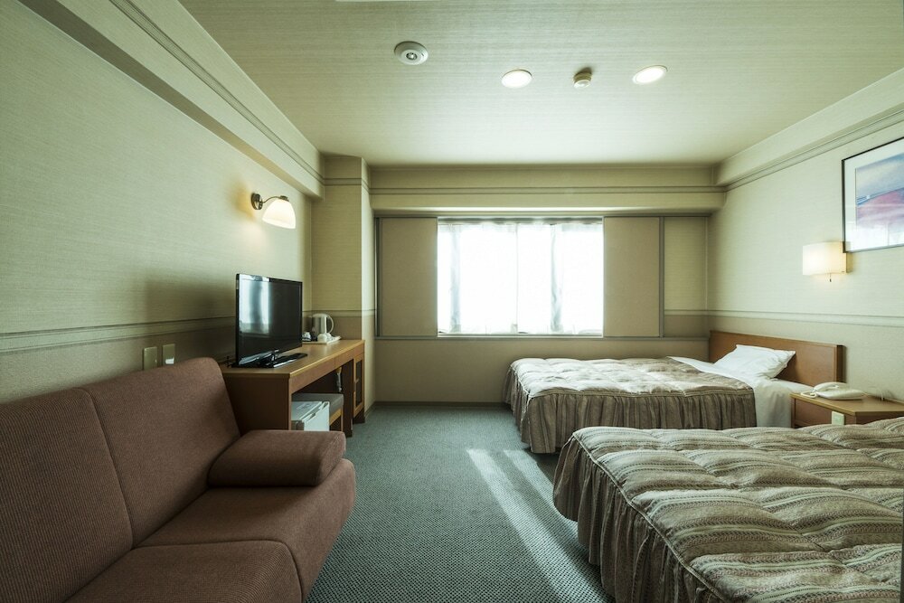 Фото Isahaya Station Hotel