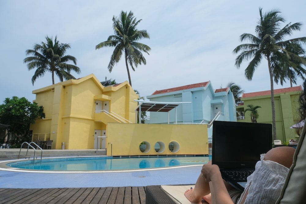 Фото Whispering Palms Beach Resort