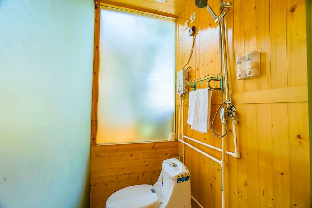 Фото Yijie Holiday Hotel Water GreatWall No. 2