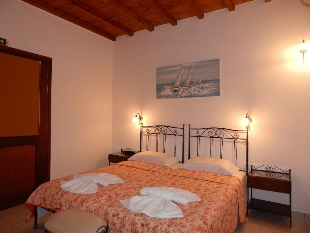 Фото Tinos Suites & Apartments
