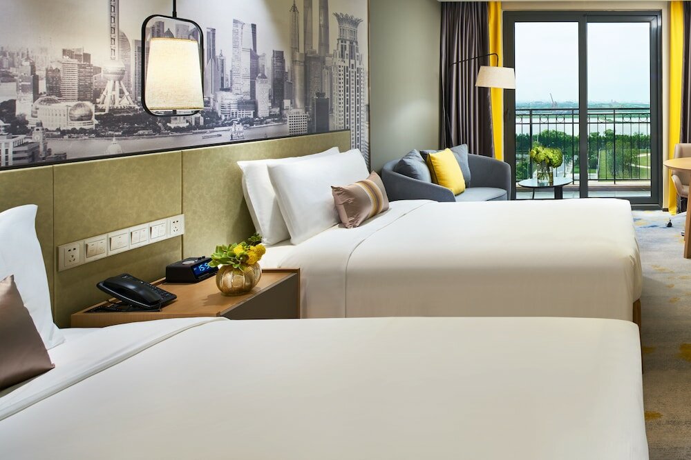 Фото The Qube Hotel Shanghai Sanjiagang