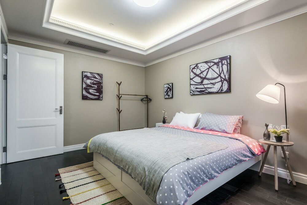 Фото Shanghai Xinchuan Boutique Apartment