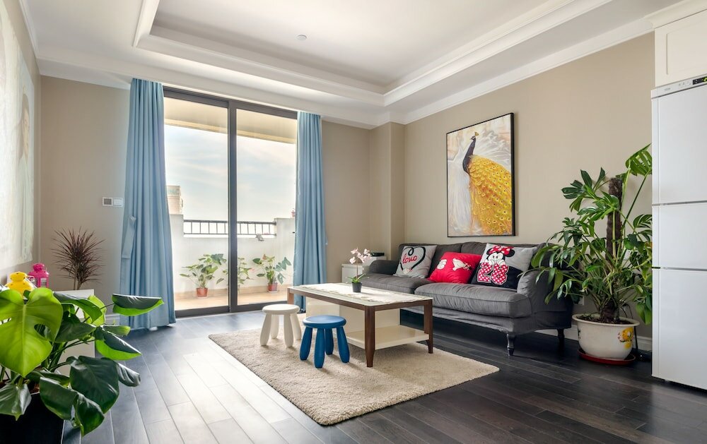 Фото Shanghai Xinchuan Boutique Apartment