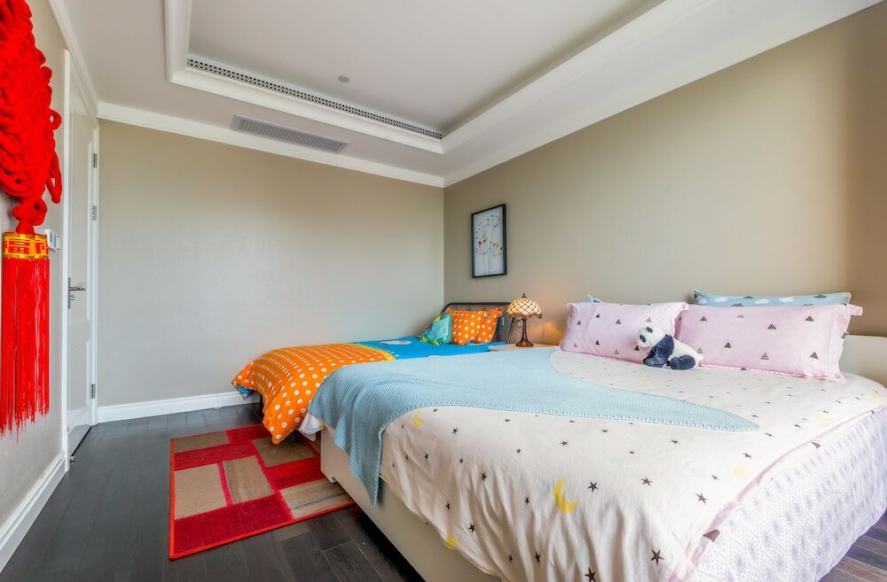 Фото Shanghai Xinchuan Boutique Apartment