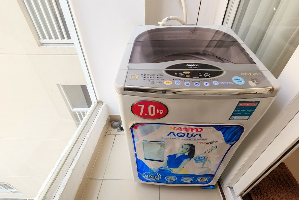 Фото Oyo 103 Airport Family Apartment