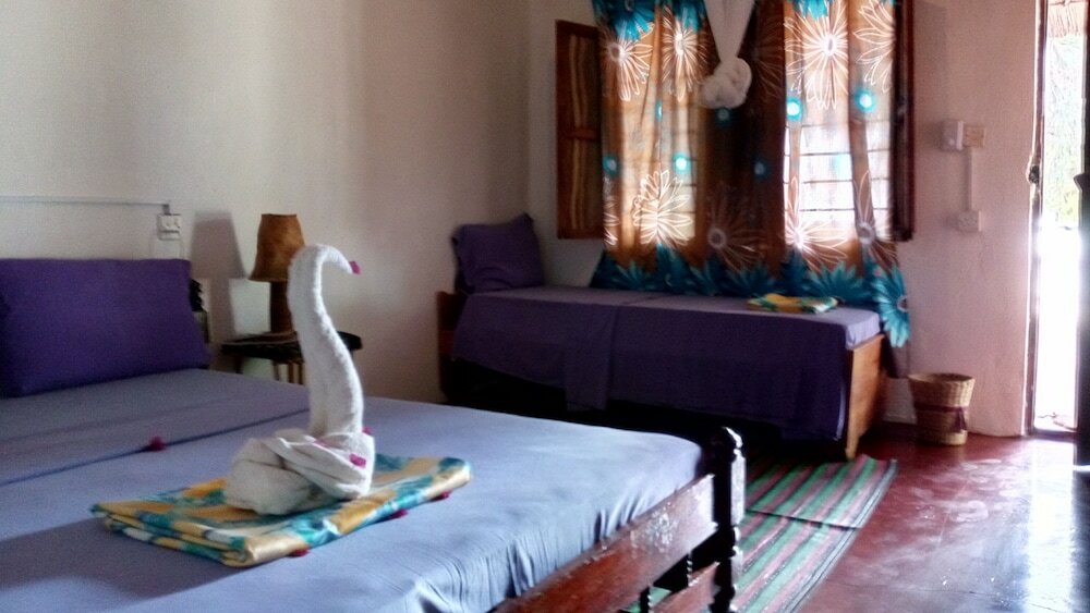 Фото Twisted Palms Lodge & Restaurant