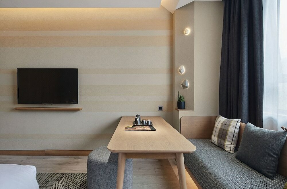 Фото Ebo Hotel Hangzhou Wulinmen