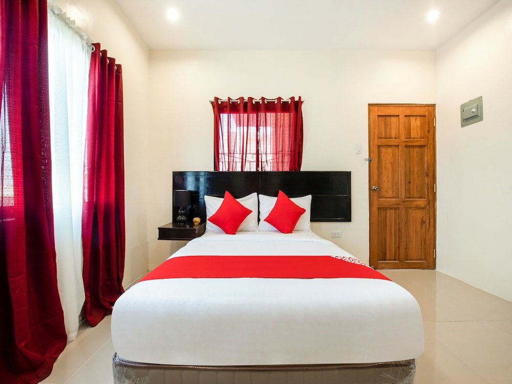 Фото Oyo 490 V-cat Apartelle