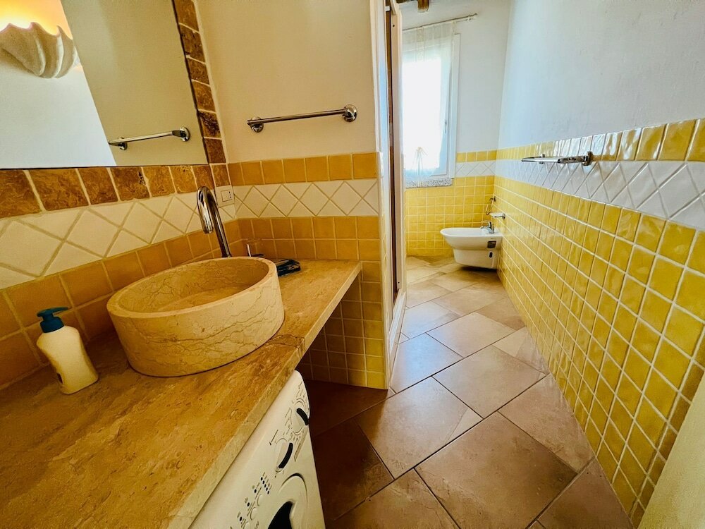 Фото Villetta Conchiglia con Piscina