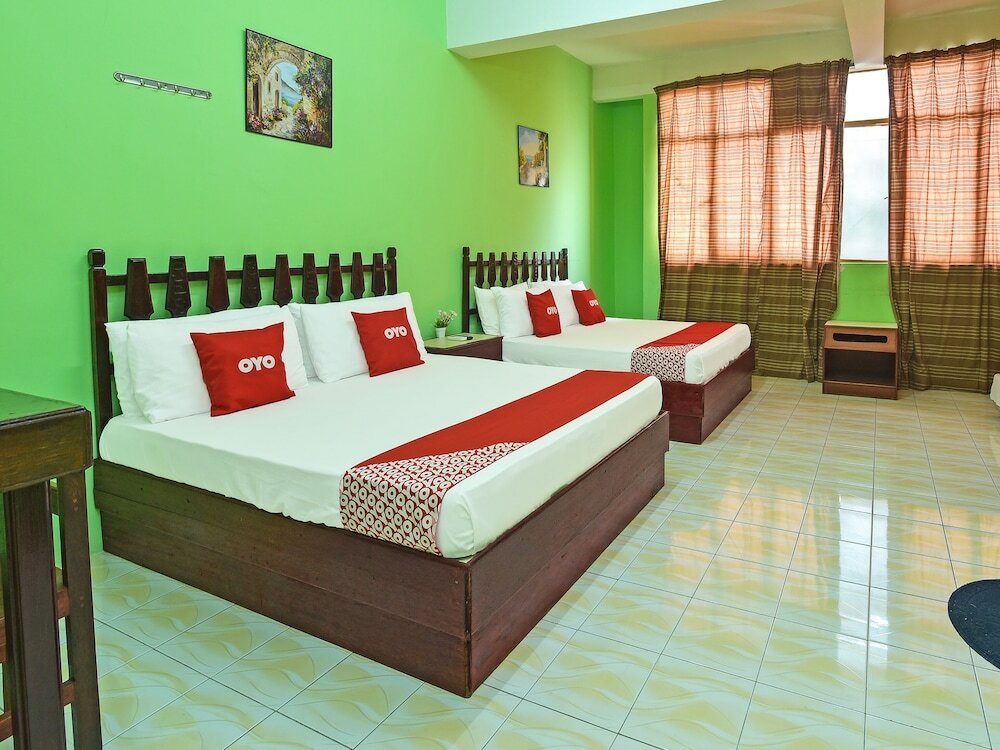 Фото Super Oyo Capital O 90659 Raintown Timbers Hotel
