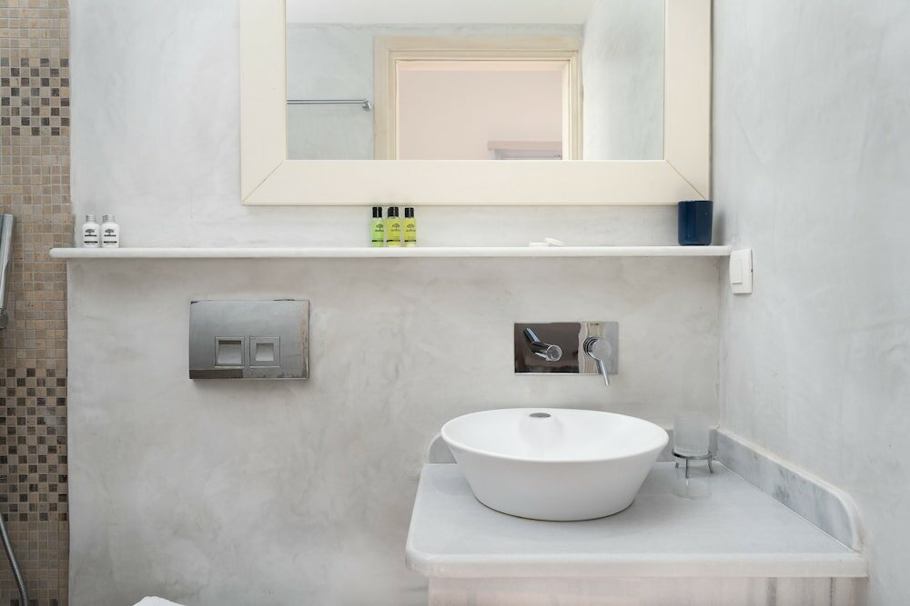 Фото Kapeli Suites