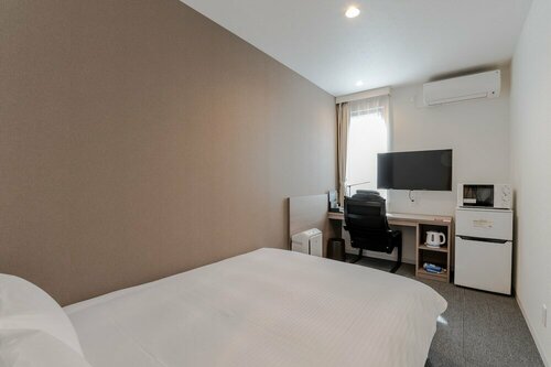 Гостиница Hotel R9 The Yard 福山 в Фукуяме