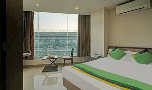 Гостиница Treebo Trend Glassotel