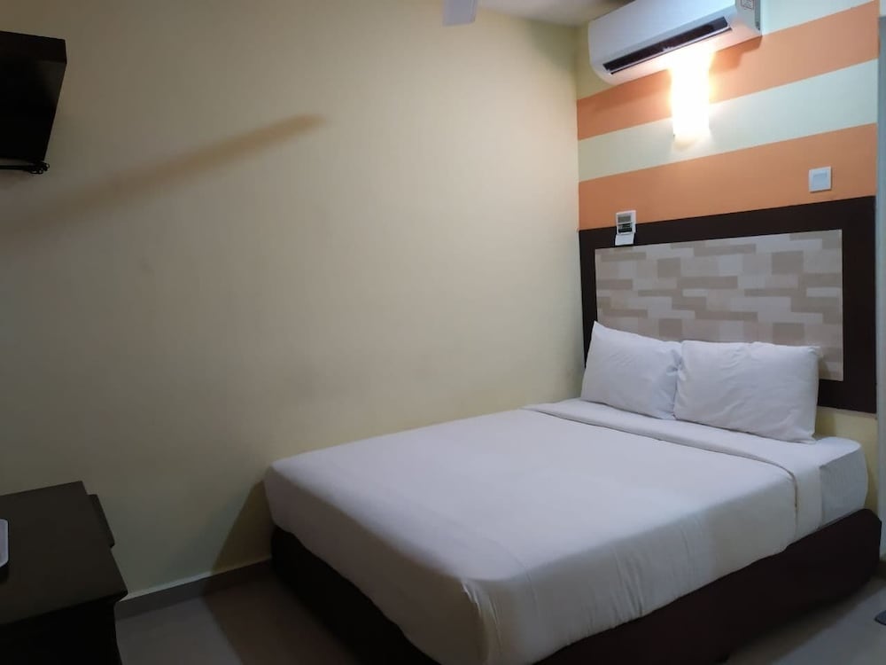 Фото Sun Inns Meru Raya