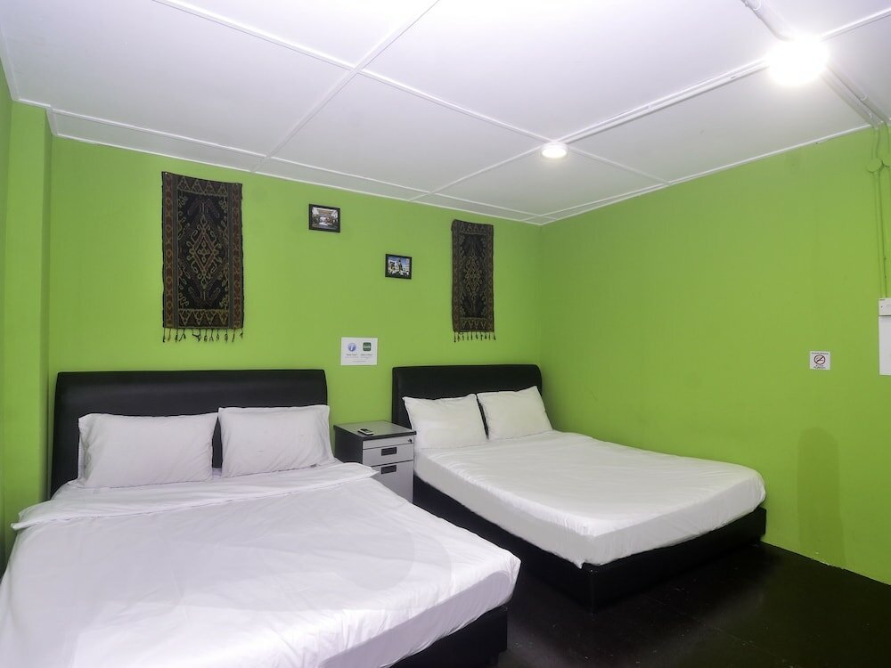 Фото Spot On 89929 Tropical Lodge