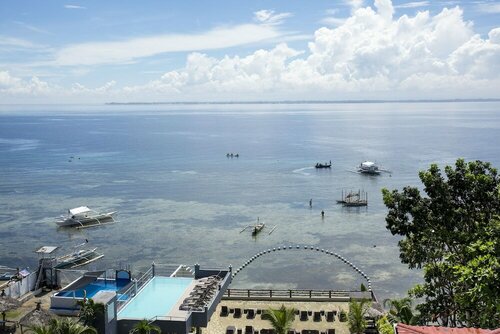 Внешний вид отеля Palmbeach Resort & SPA в Лапу-Лапу, фото 2