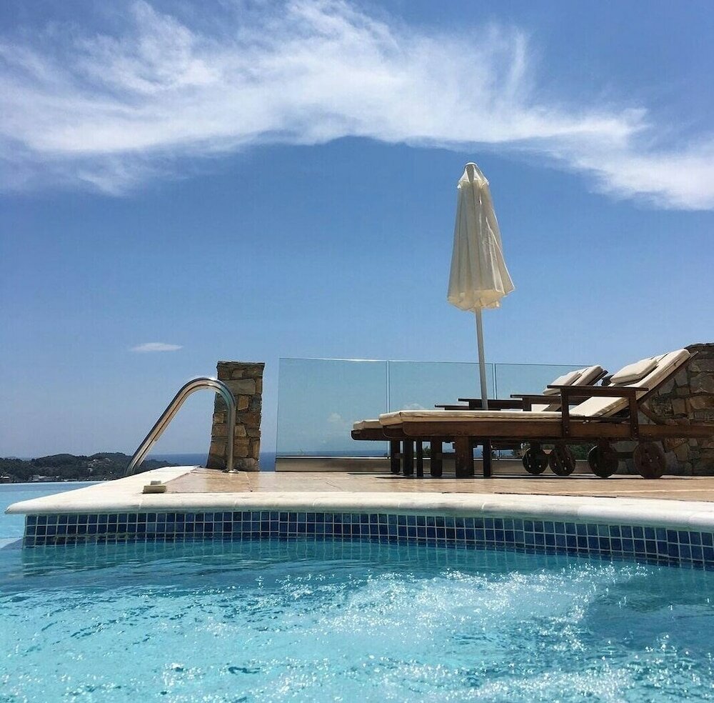 Фото Skiathos Garden Cottages