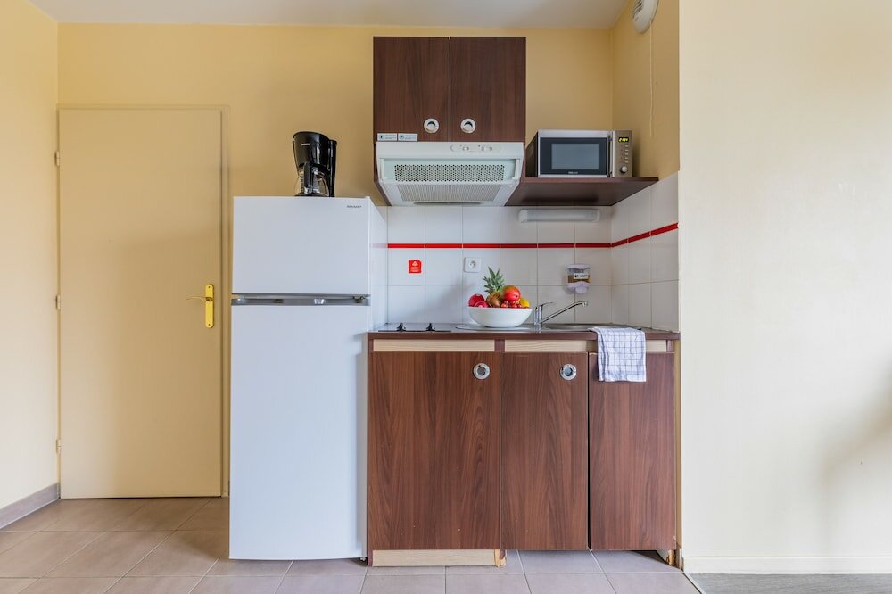 Фото Zenitude Hôtel - Résidences Magny les Hameaux