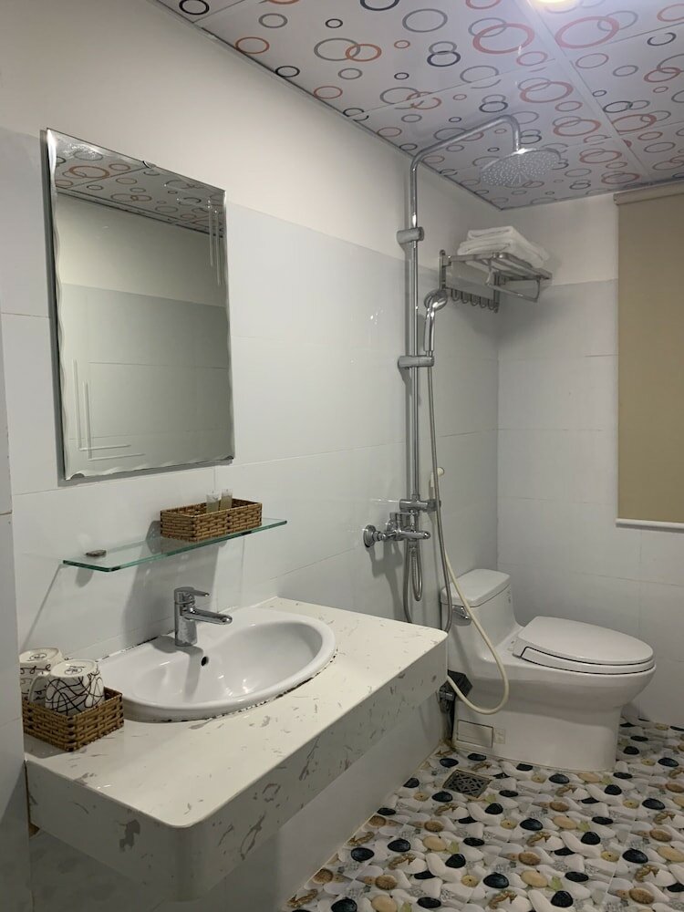 Фото Oyo 1028 Flower House Apartment