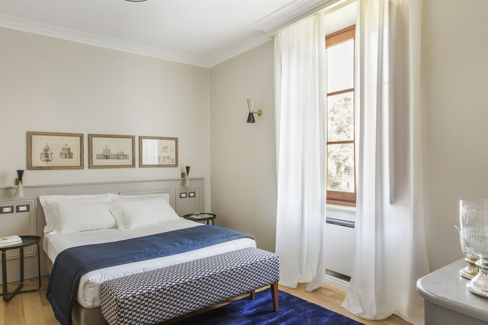 Фото Favilla Hotel di Charme