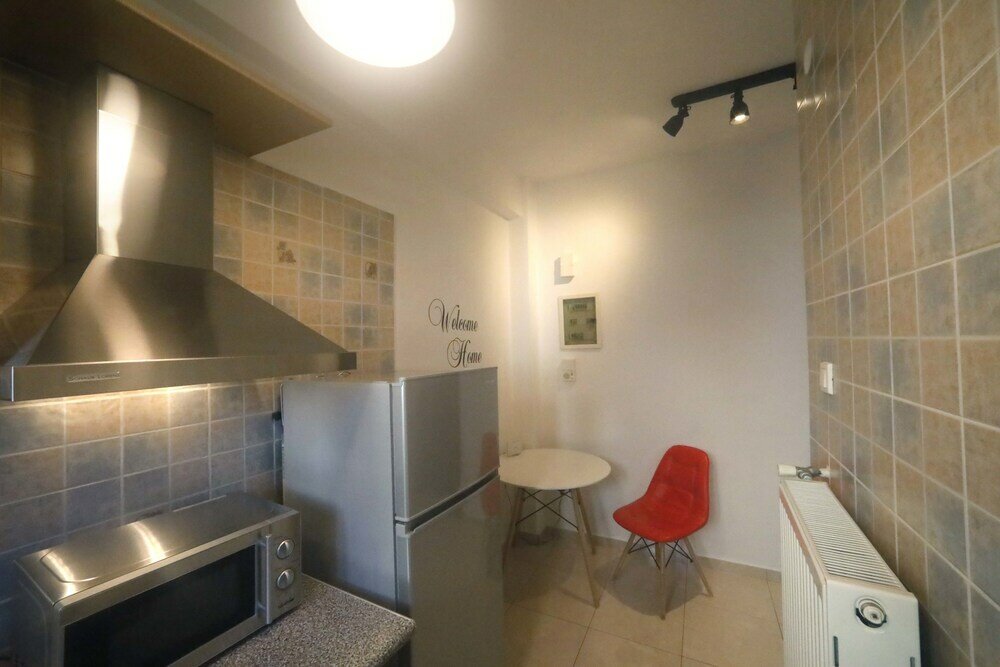 Фото Metaxourghio Boutique Apartment