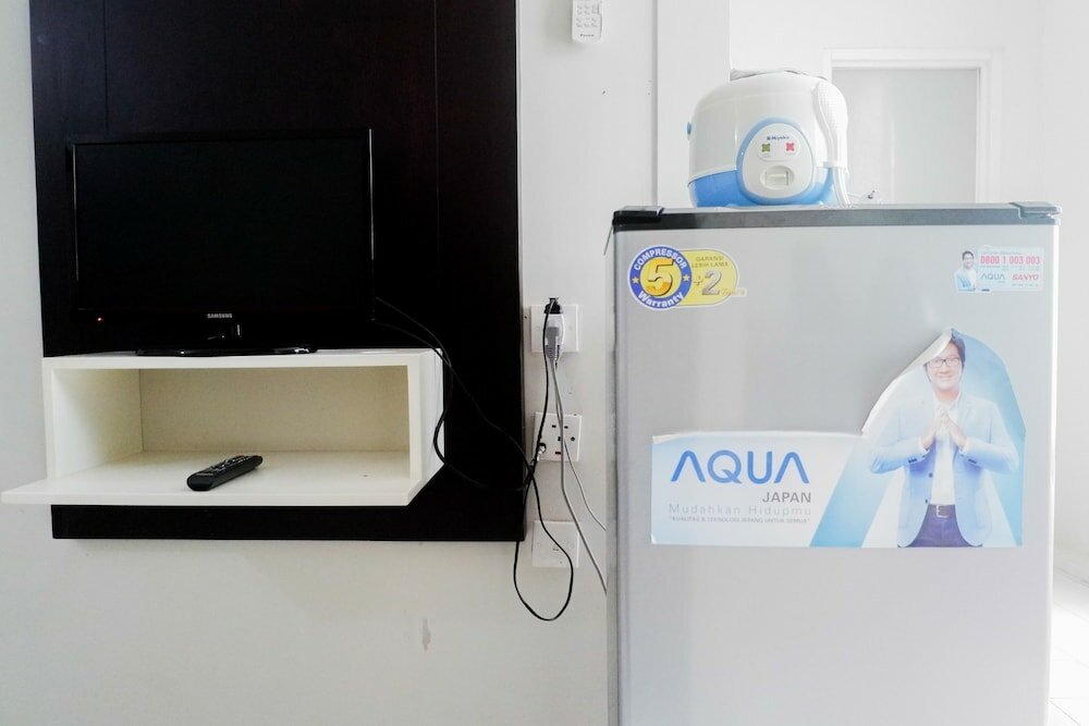 Фото Minimalist 2br at Dian Regency by Travelio