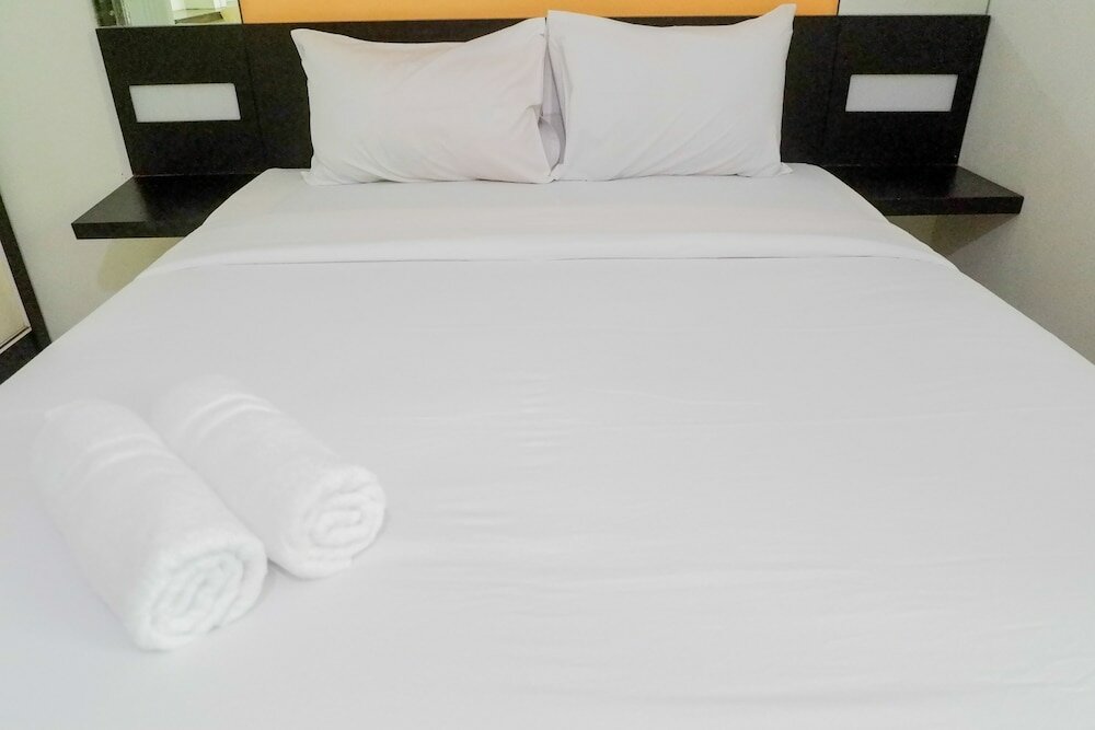 Фото Minimalist 2br at Dian Regency by Travelio