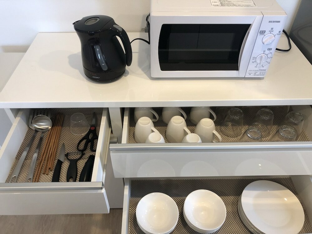 Фото Minato Chatan Seaside Condominium