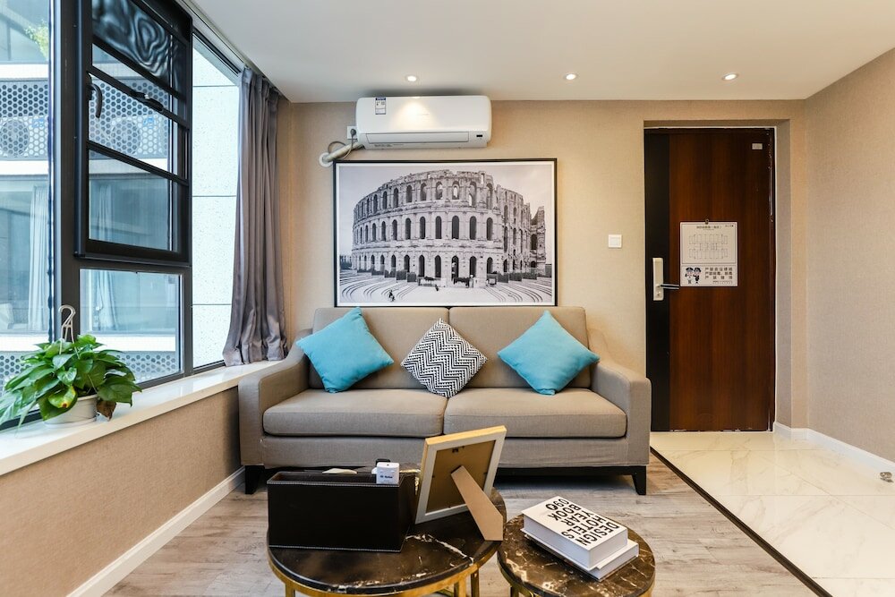 Фото Yue Qi Hotel Apartment