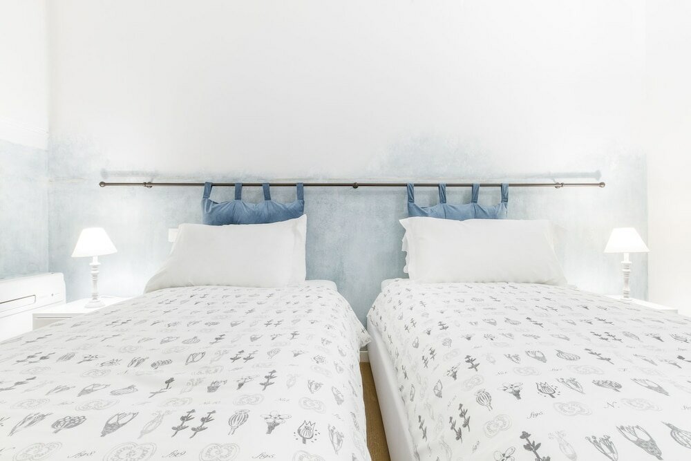 Фото GetTheKey San Vitale Apartment